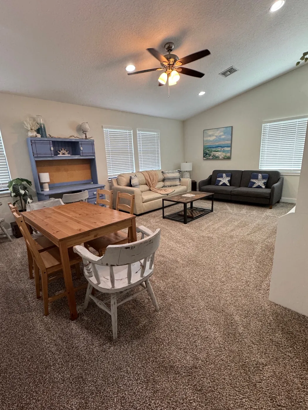Open living and dining area cleaned for a vacation rental turnover
