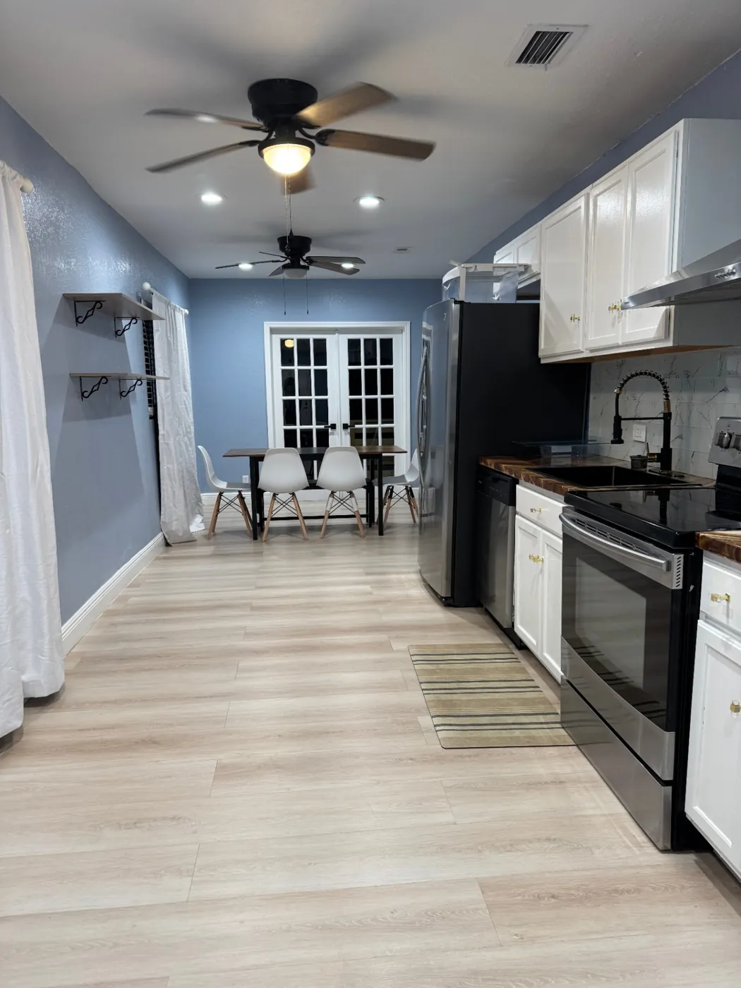 Kitchen with sanitized countertops and streak-free stainless appliances