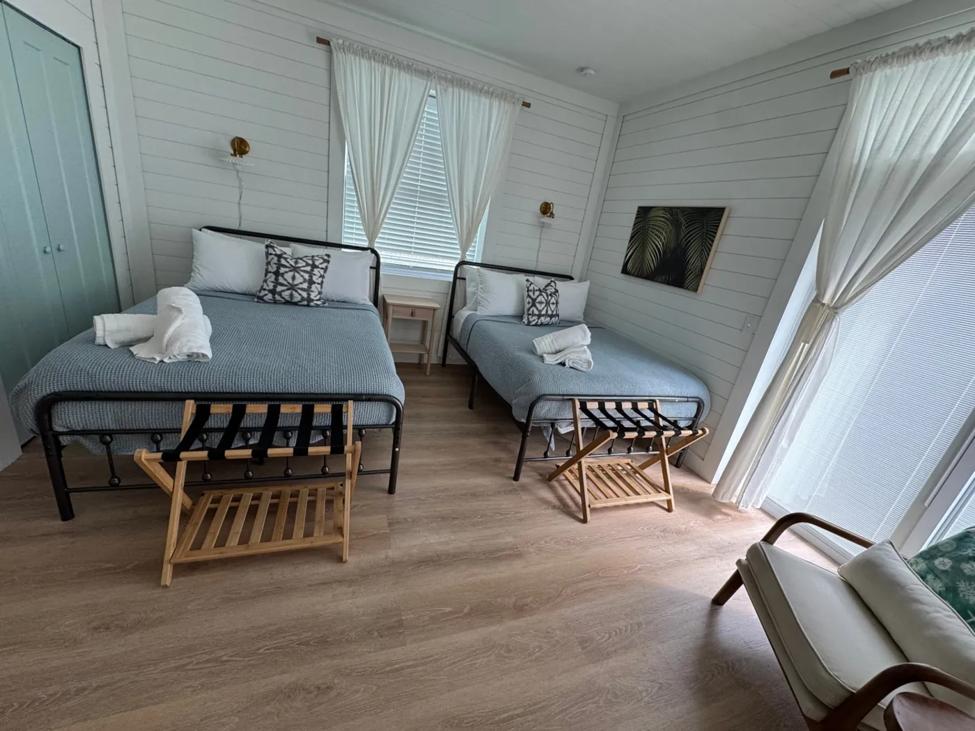 Guest bedroom prepared with fresh linens for a rental turnover