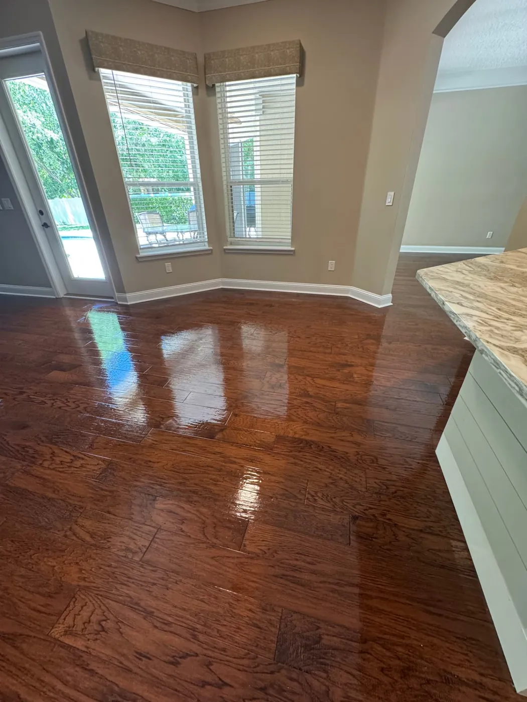 Hardwood floors polished to a shine during a move-out cleaning